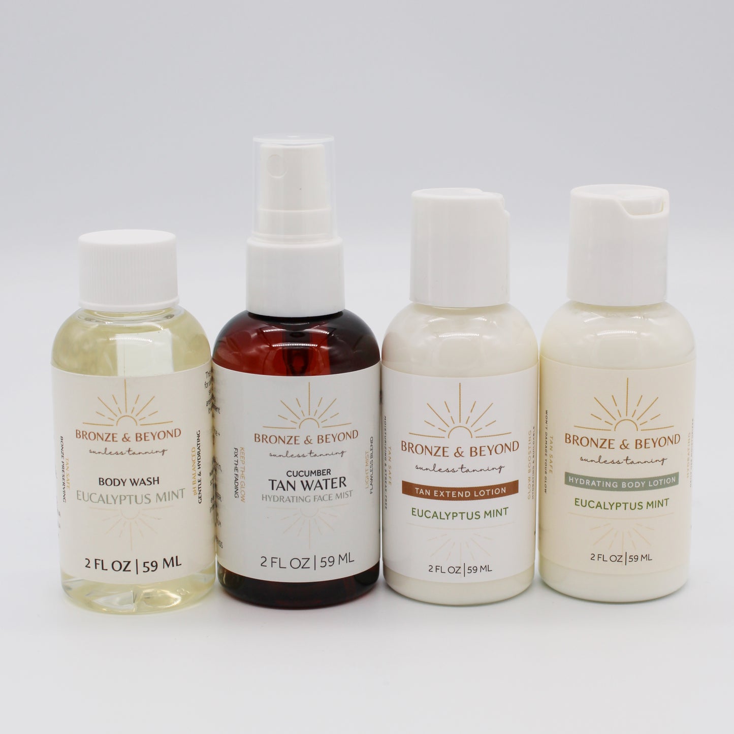 Four bottles of Bronze & Beyond skincare products on a white background