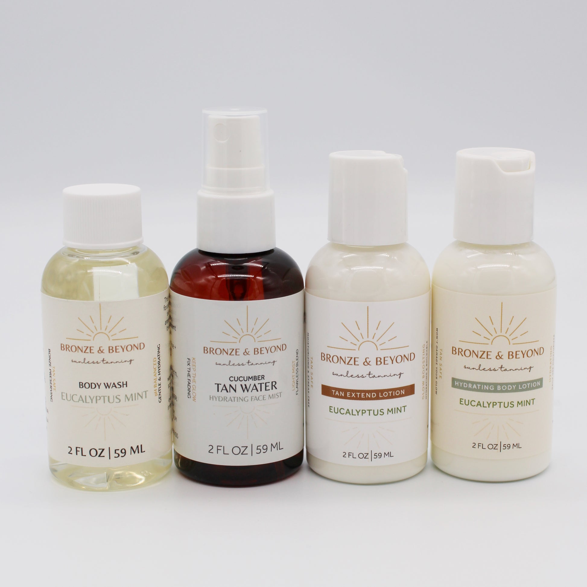 Four bottles of Bronze & Beyond skincare products on a white background