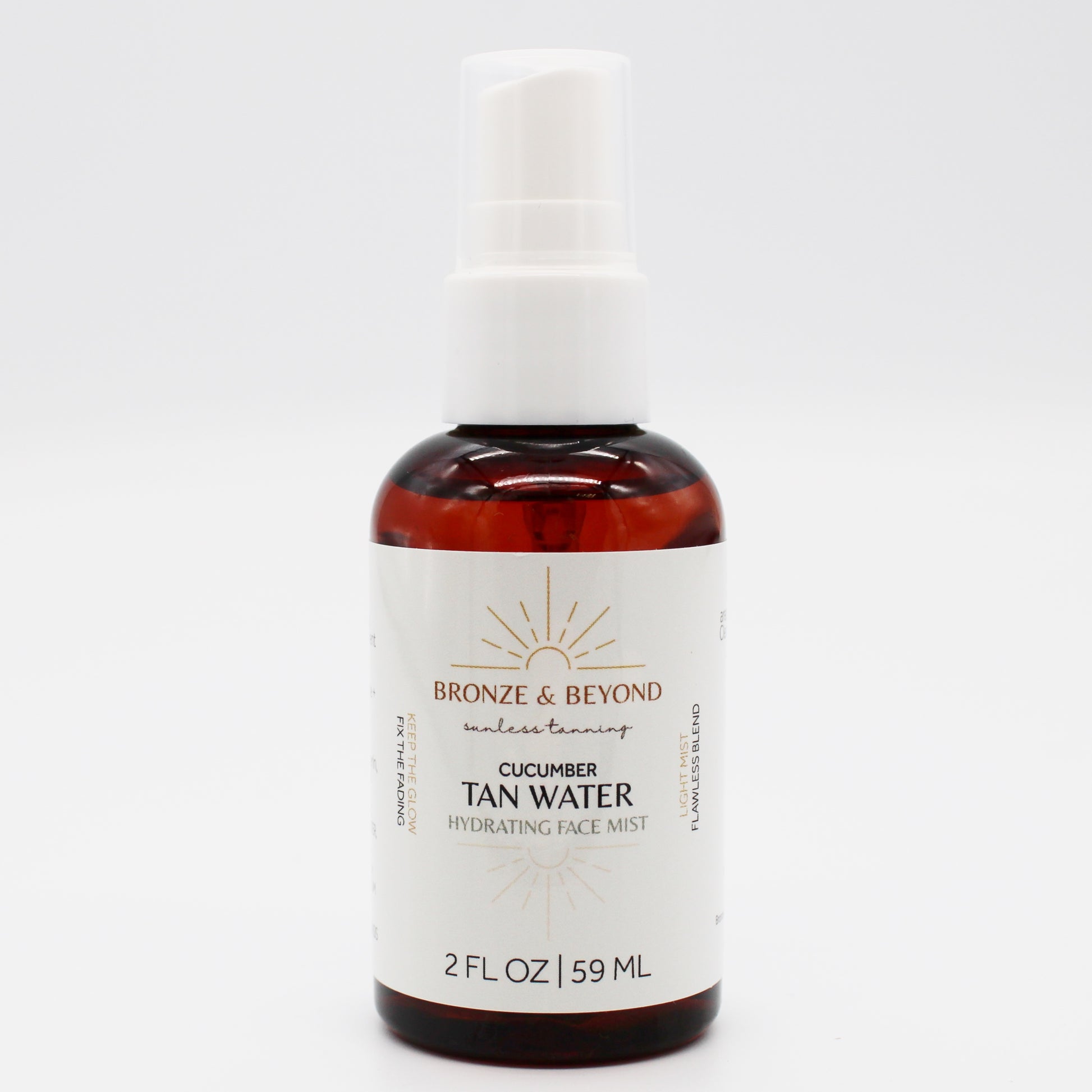 Bottle of Bronze & Beyond Cucumber Tan Water hydrating face mist on a white background