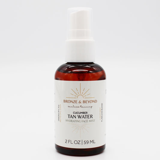 Bottle of Bronze & Beyond Cucumber Tan Water hydrating face mist on a white background