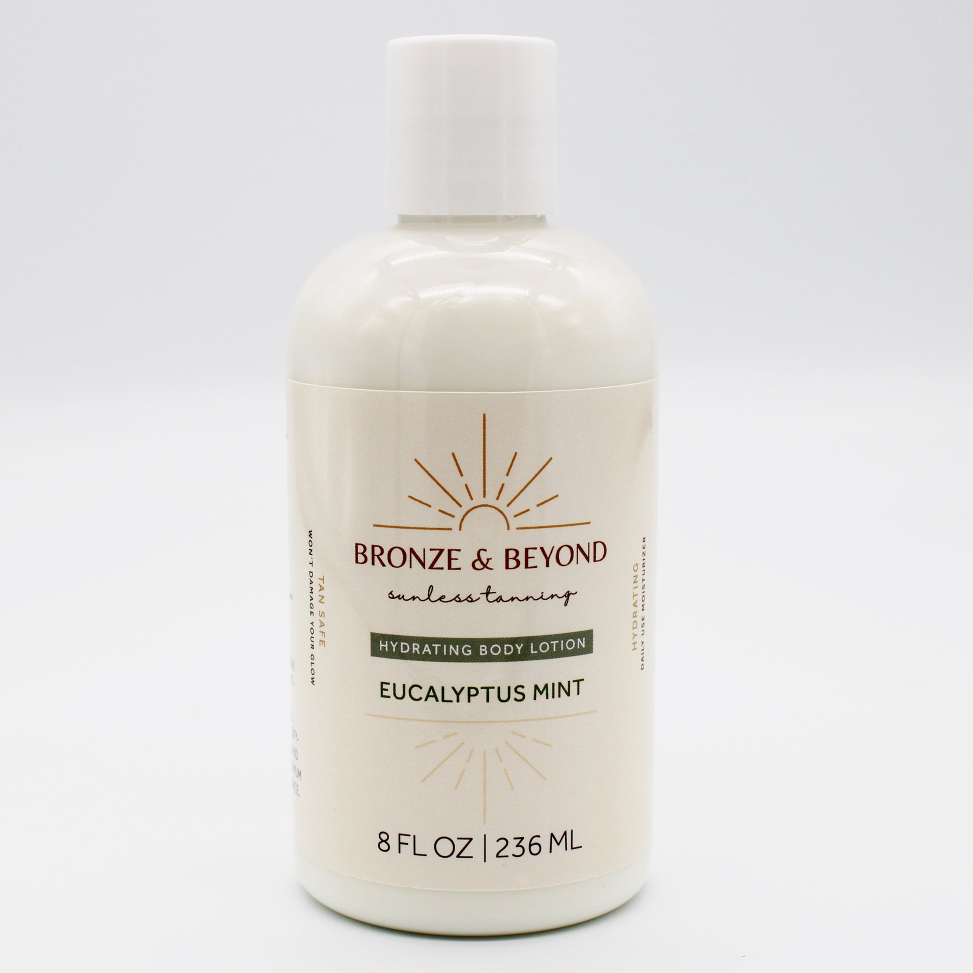 Bottle of Bronze & Beyond eucalyptus mint tan safe body lotion on a white background